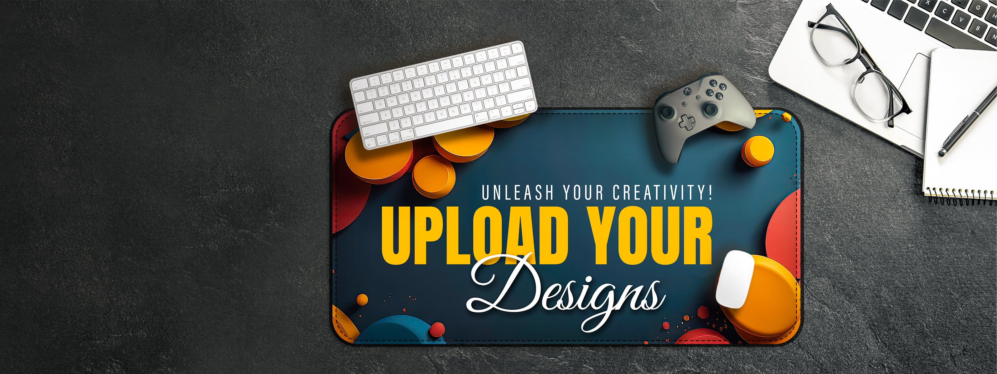 Promotional graphic with text 'Unleash Your Creativity! Upload Your Designs' on a colorful background with office items.