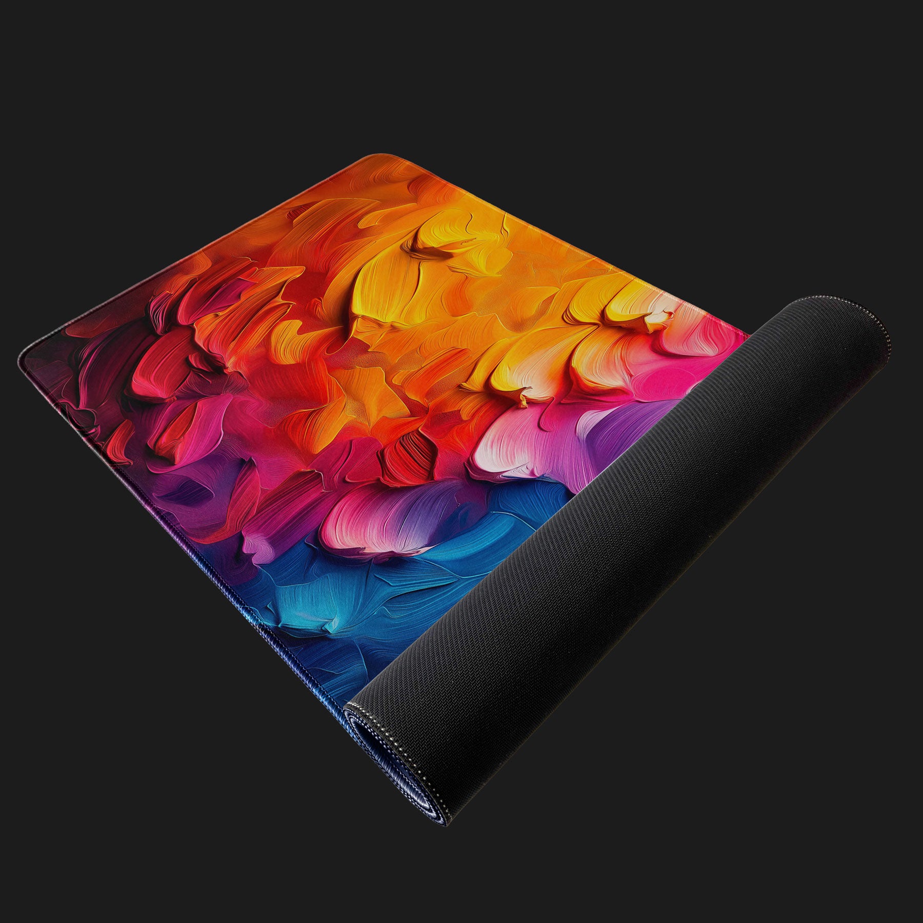 Extra-large desk mat with abstract rainbow color brush strokes