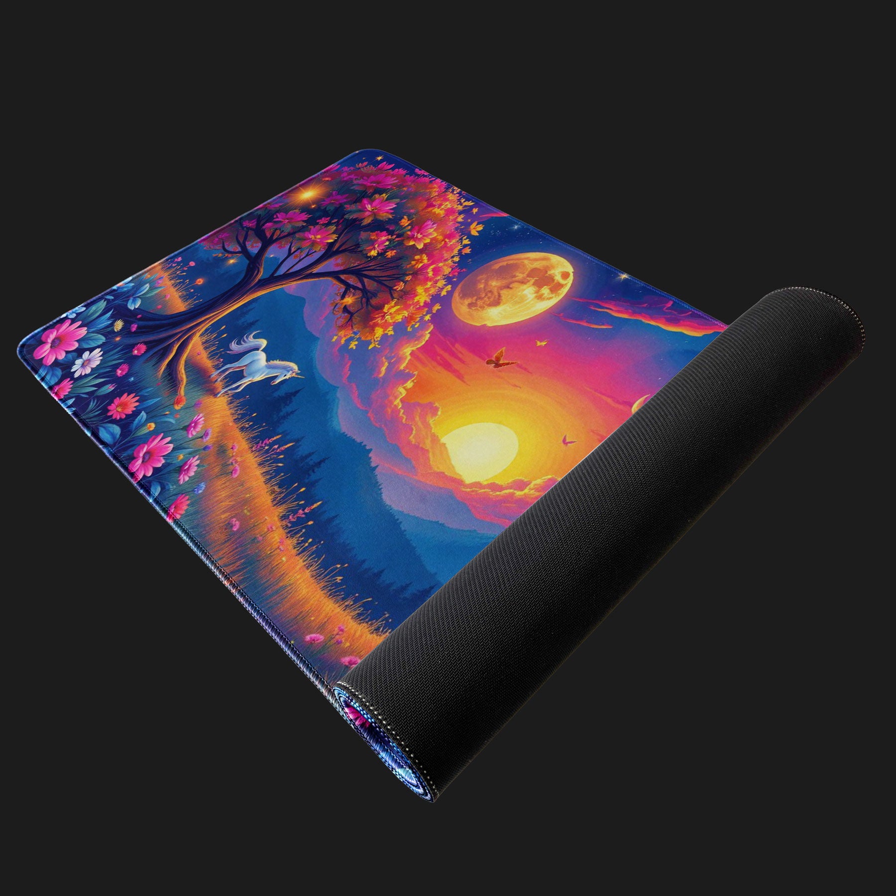 Decorative mouse pad with fantasy design featuring a unicorn, trees, and celestial elements on a black background.