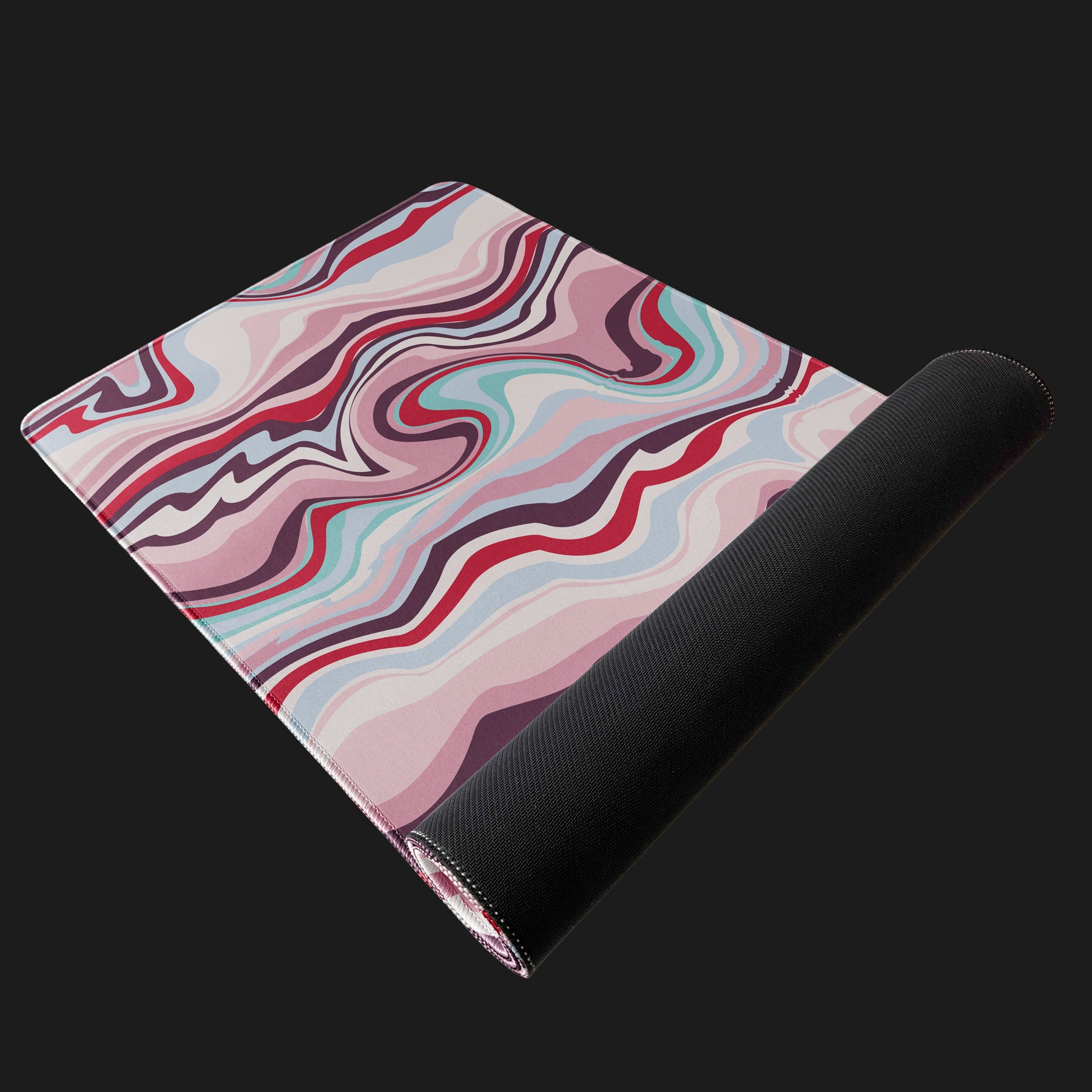 Yoga mat with colorful wavy pattern on a black background