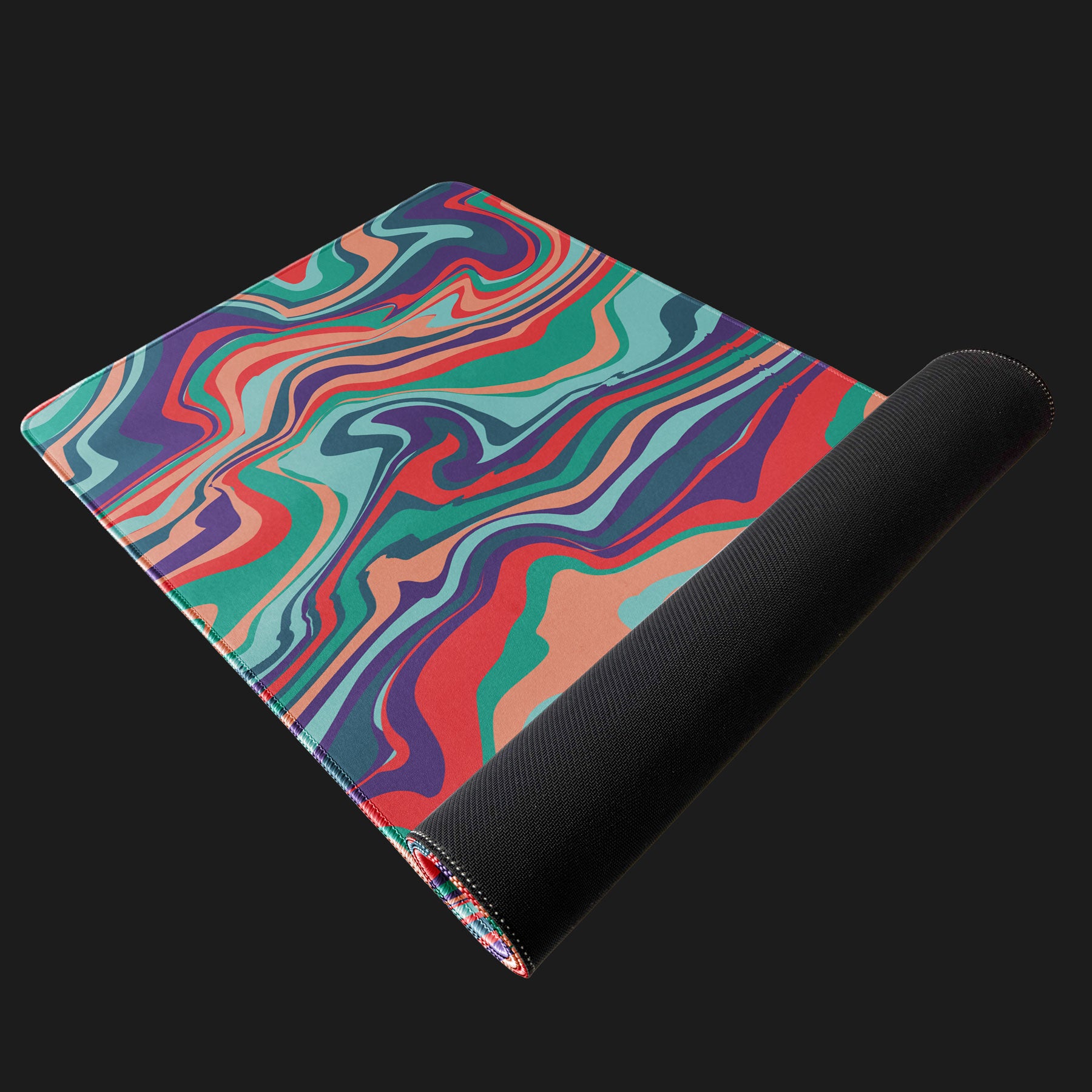 Extra-large desk mat featuring colorful swirl wave design
