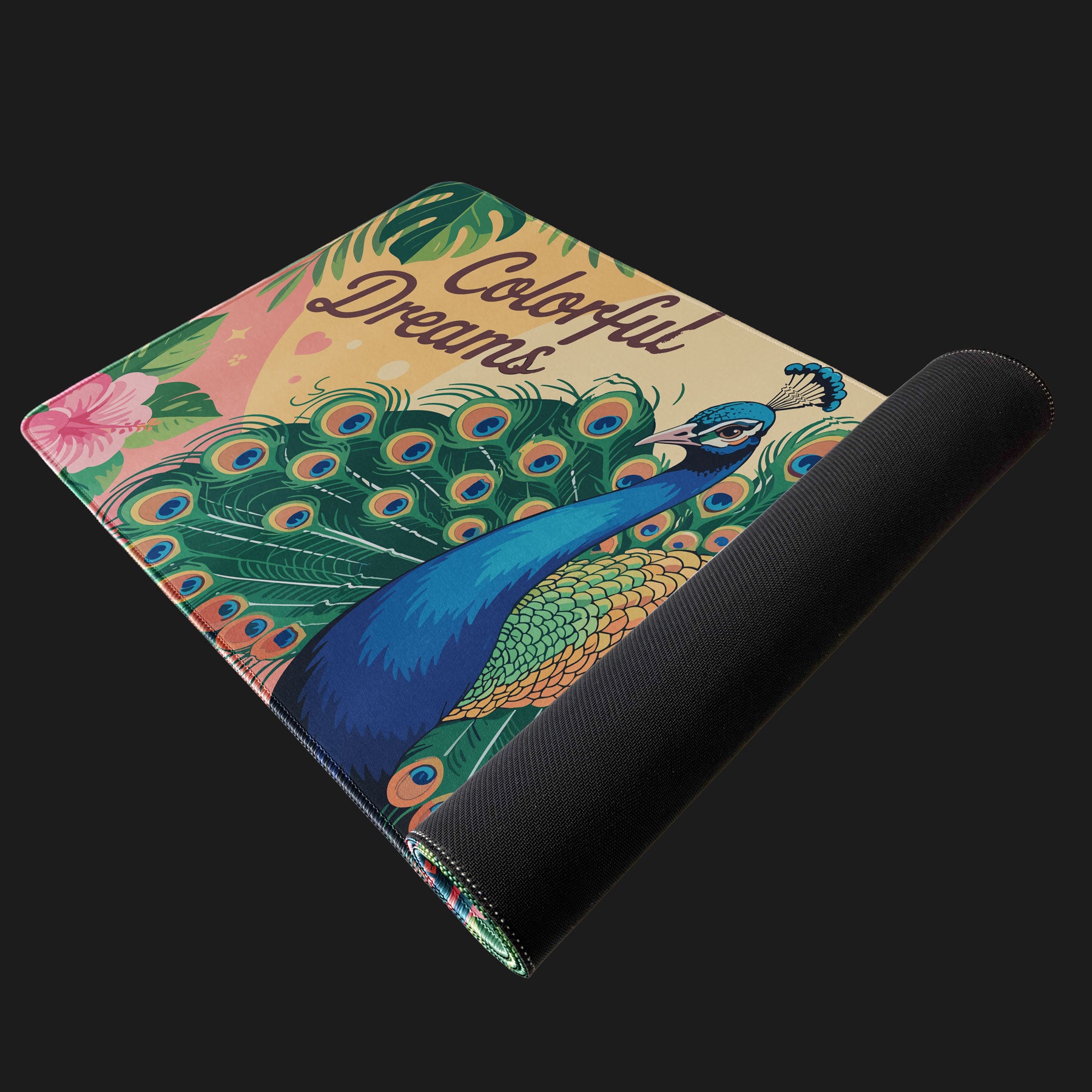 Modern workspace desk mat featuring peacock design and “Colorful Dreams” text
