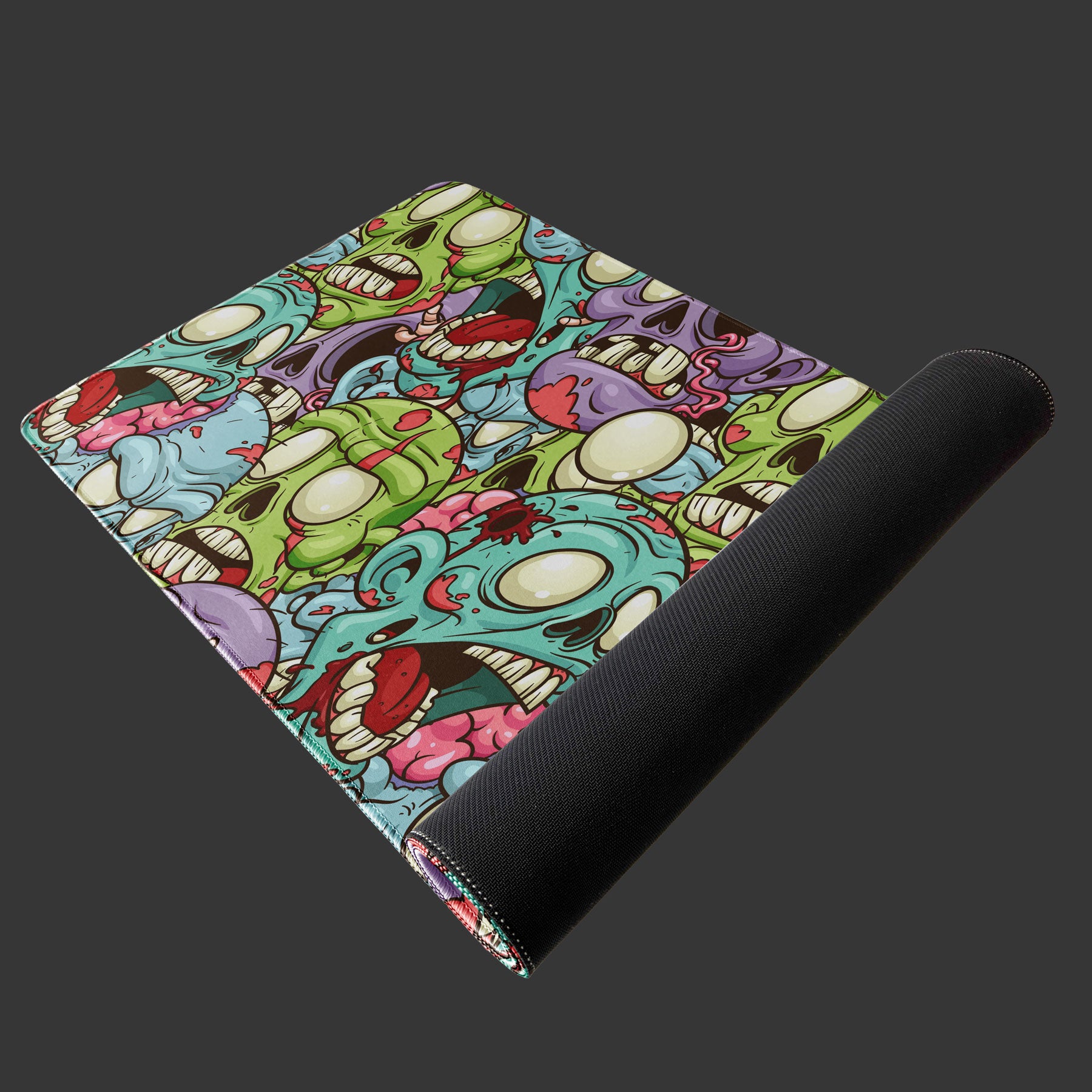 Large desk mat with grotesque zombie horde illustration for gamers.