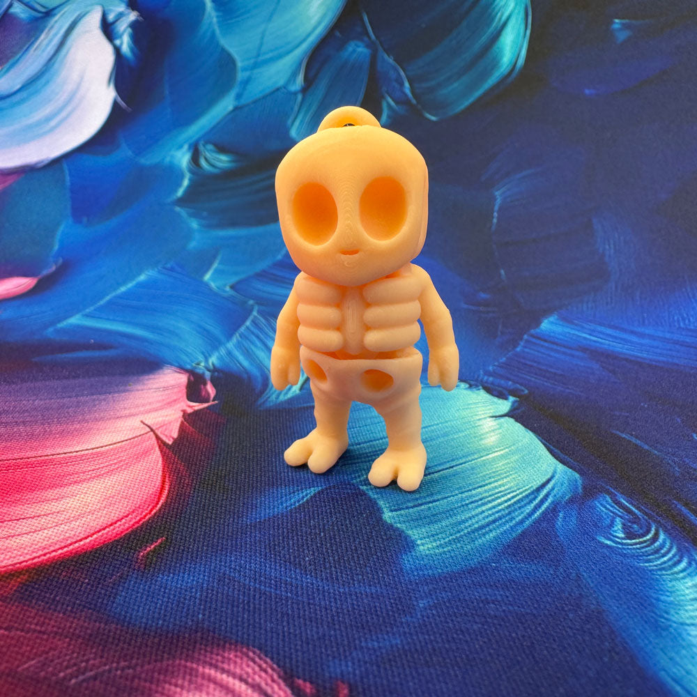 Yellow cartoon-like figurine on a colorful abstract background
