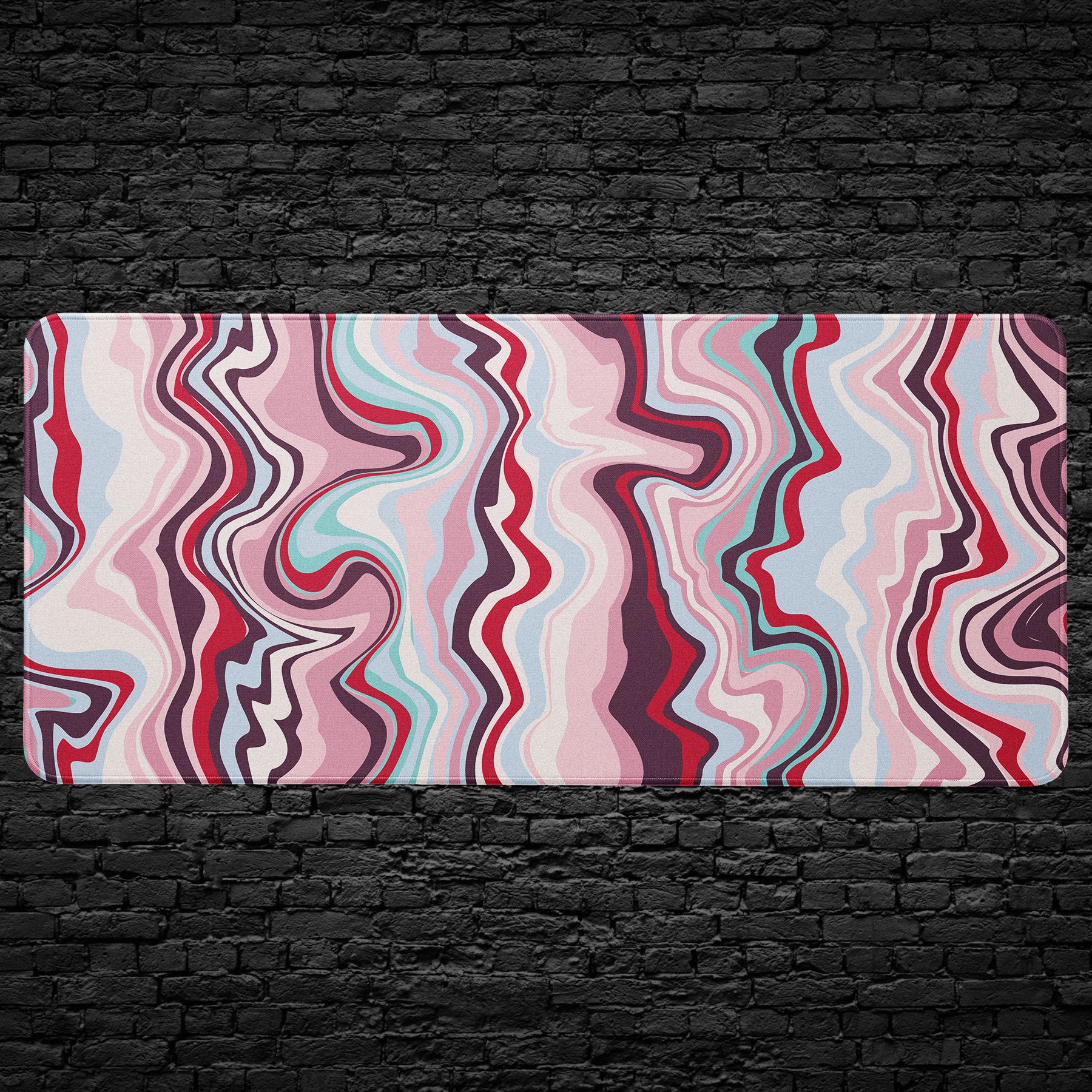 Colorful wavy patterned rug on a black brick wall