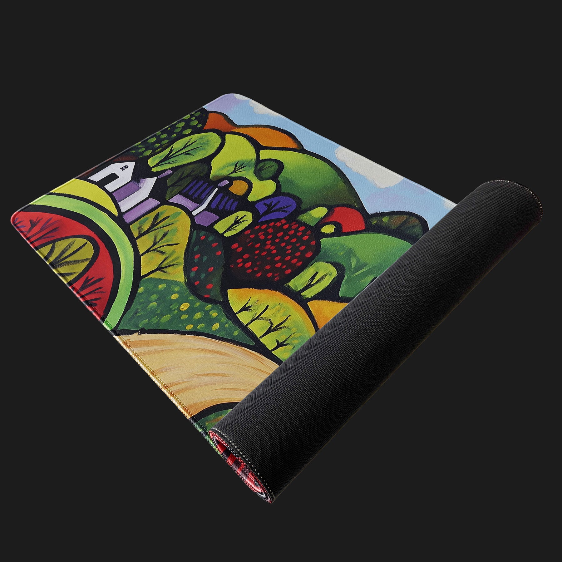 Office desk mat with bold colorful countryside landscape artwork