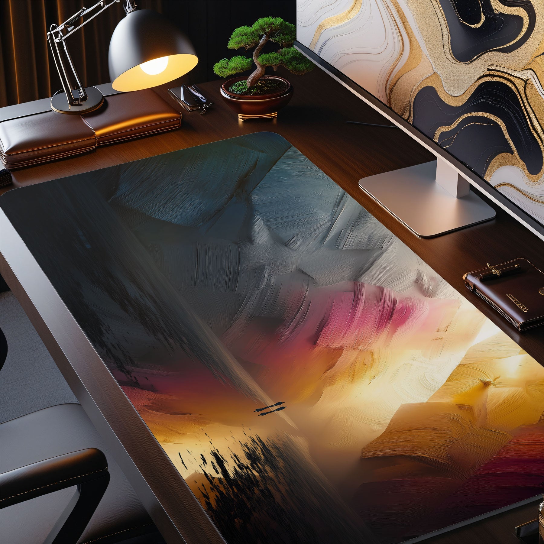 Desk setup with a large monitor displaying a colorful abstract design, surrounded by office items.