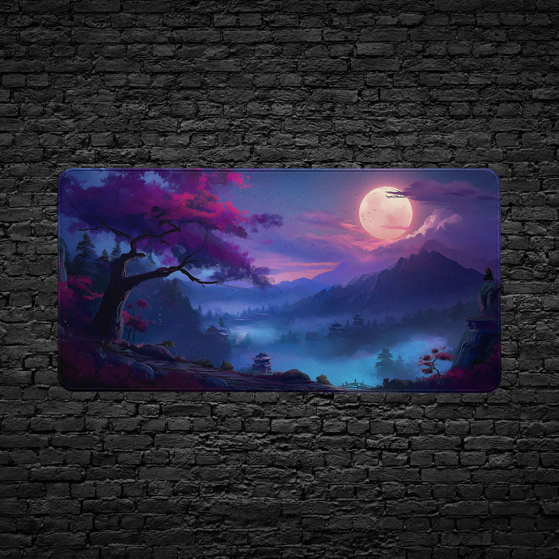 Extended gaming desk mat featuring full moon over tranquil Japanese valley.