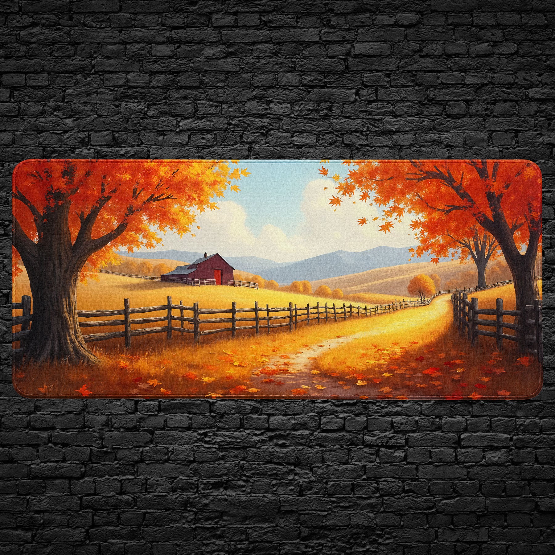 Autumn farm desk mat with red barn and golden fields.