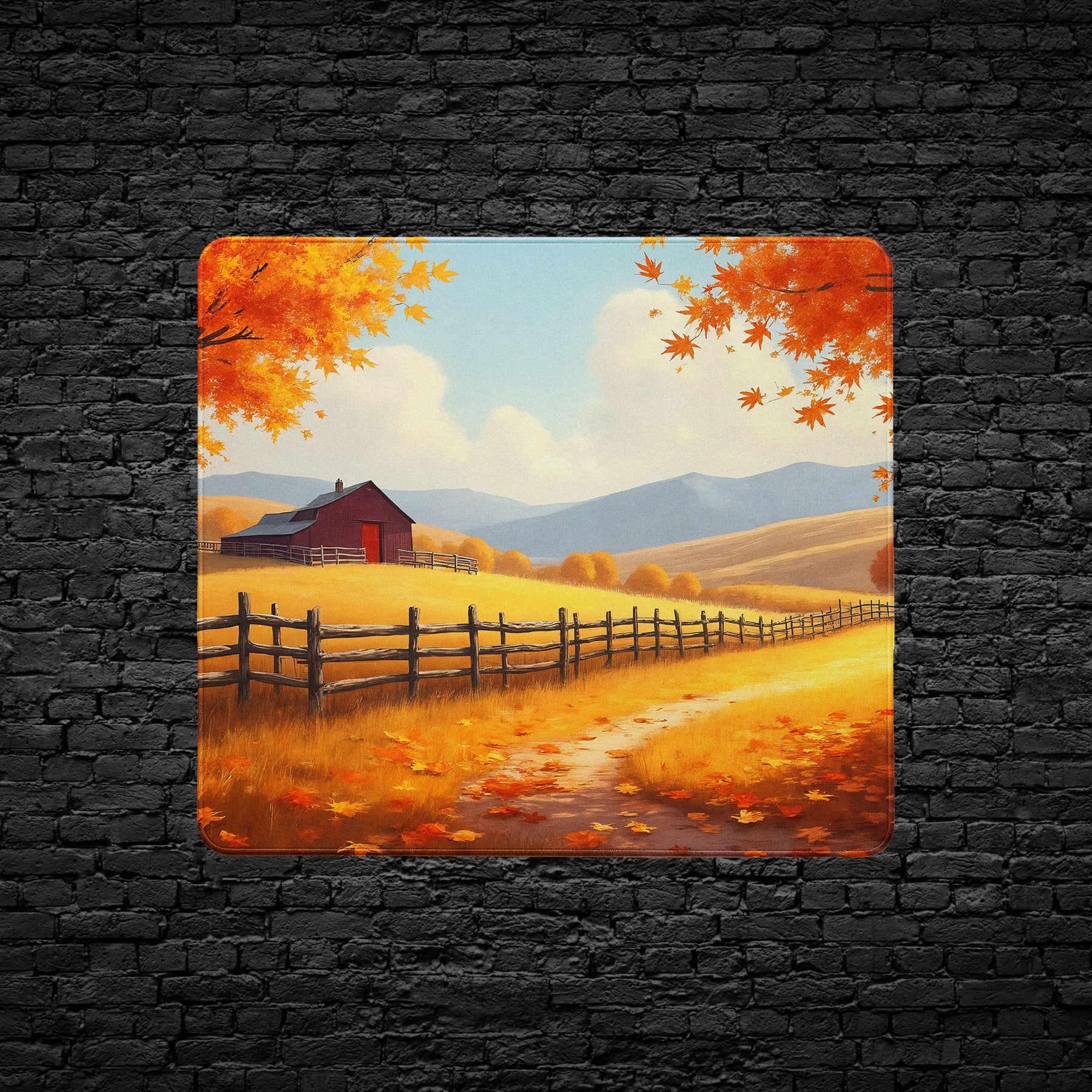 Cozy autumn landscape desk mat with barn and mountains.