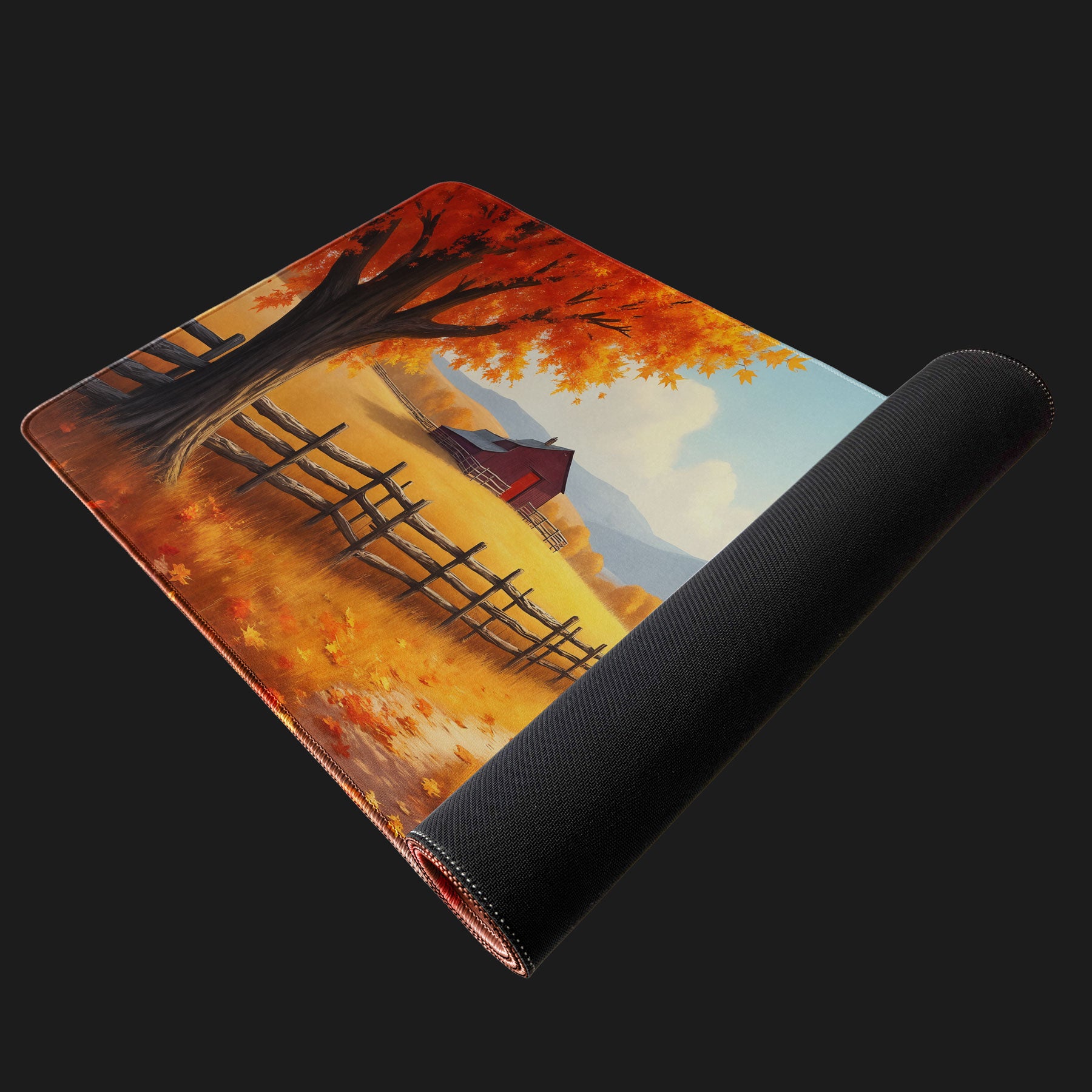 Desk mat featuring fall scenery with trees, fences, and farm view.