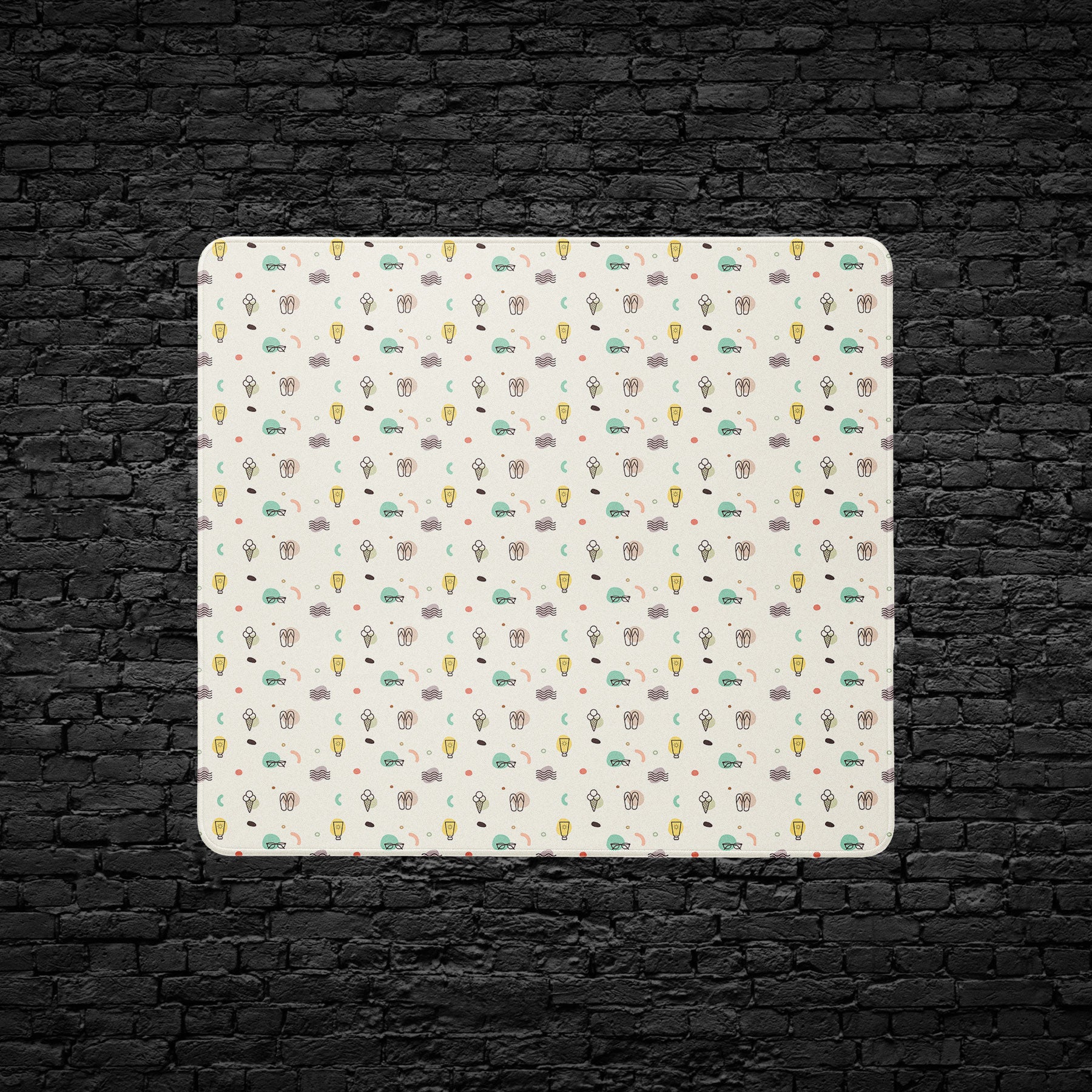 Fun doodle design with ice cream cones and lightbulbs on desk mat