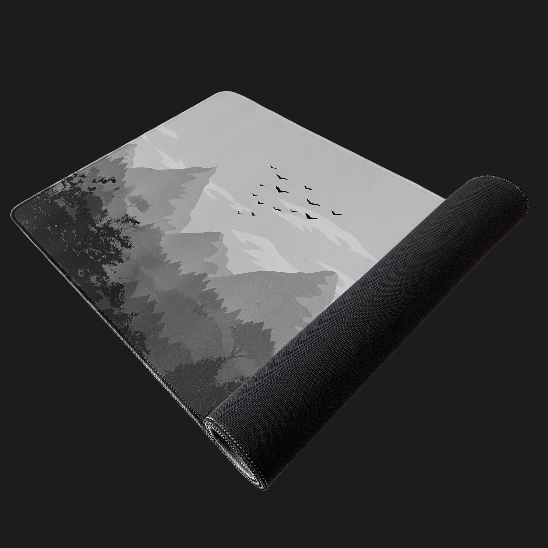 Modern minimalist desk mat with nature-inspired mountain design.