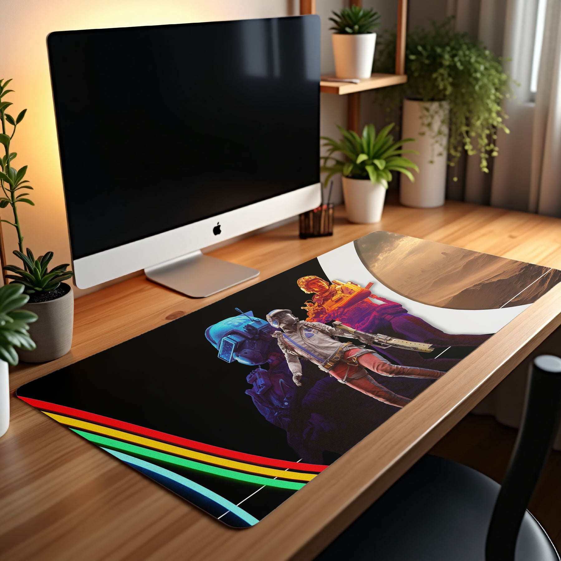 ARC Raiders Desk setup with a computer monitor and colorful mouse pad featuring artistic design.