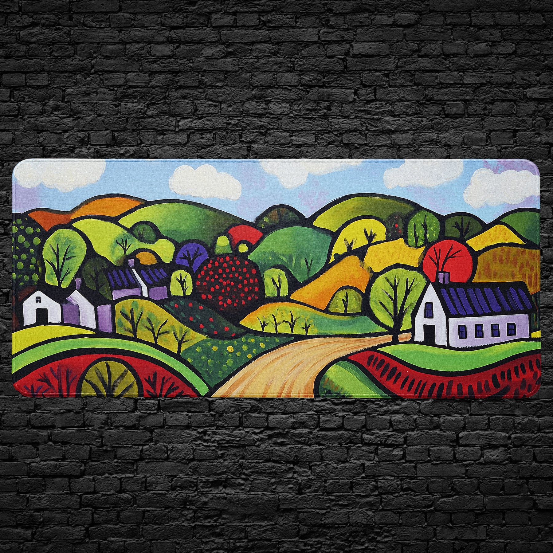 Folk art countryside desk mat with rolling hills and cottages